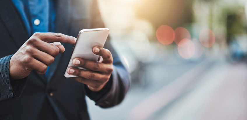 man with phone in hand